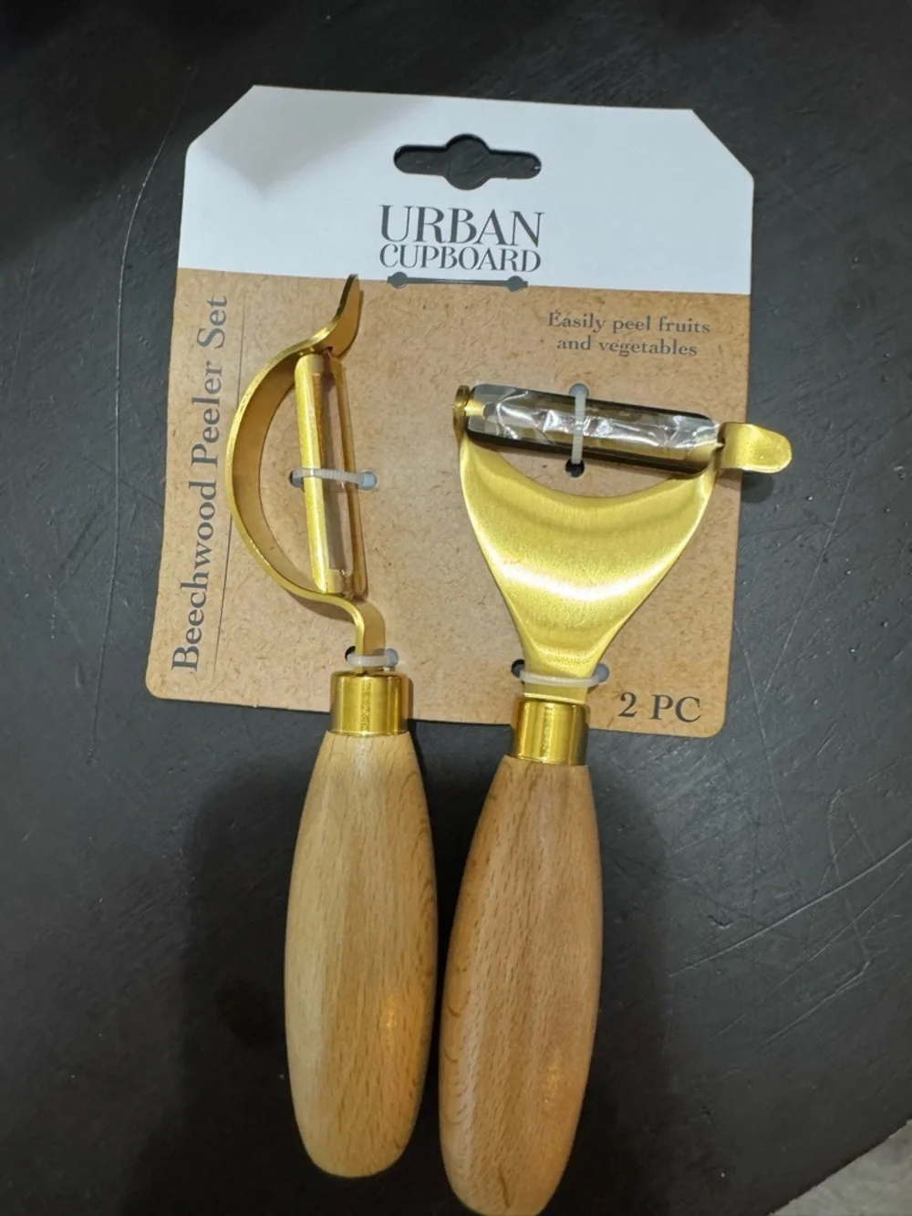 NWT Urban Cupboard Beechwood 2-PC Peeler Set - Gold